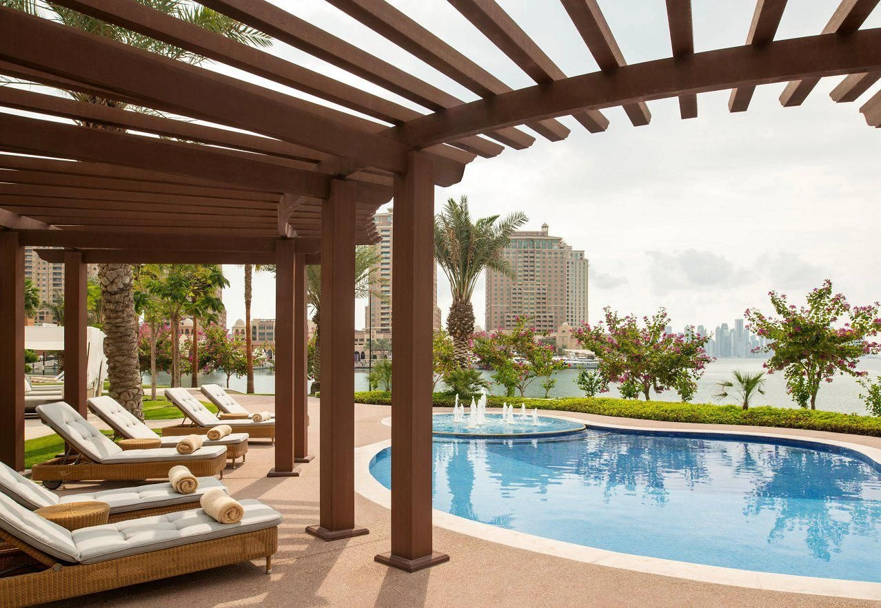 Complex of furnished townhouses on the seafront with a hotel and swimming pools, Doha, Qatar