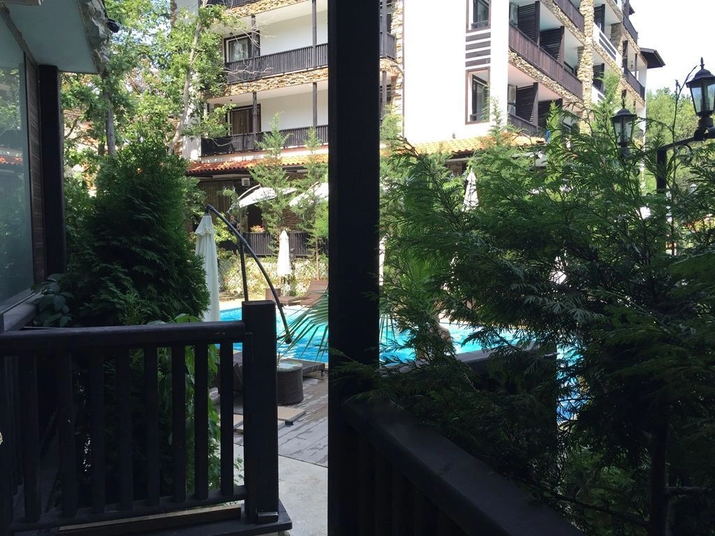 Apartment in a pine-oak grove overlooking the pool in Primorsko, Bulgaria