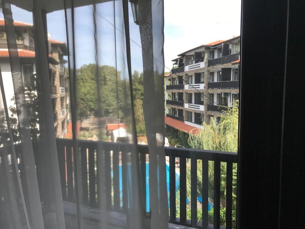 Apartment with furniture and appliances overlooking the pool in Primorsko, Bulgaria