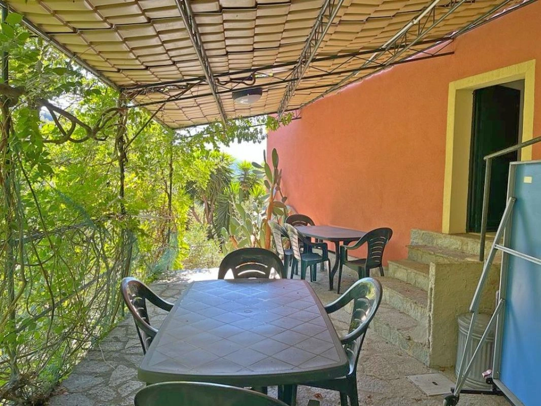 Three-storey villa in the suburbs of Genoa surrounded by green hills, Italy