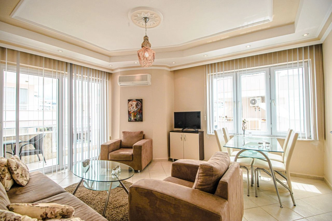 Moderno apartamento 2+1 en la primera línea de playa en Mahmutlar, Alanya