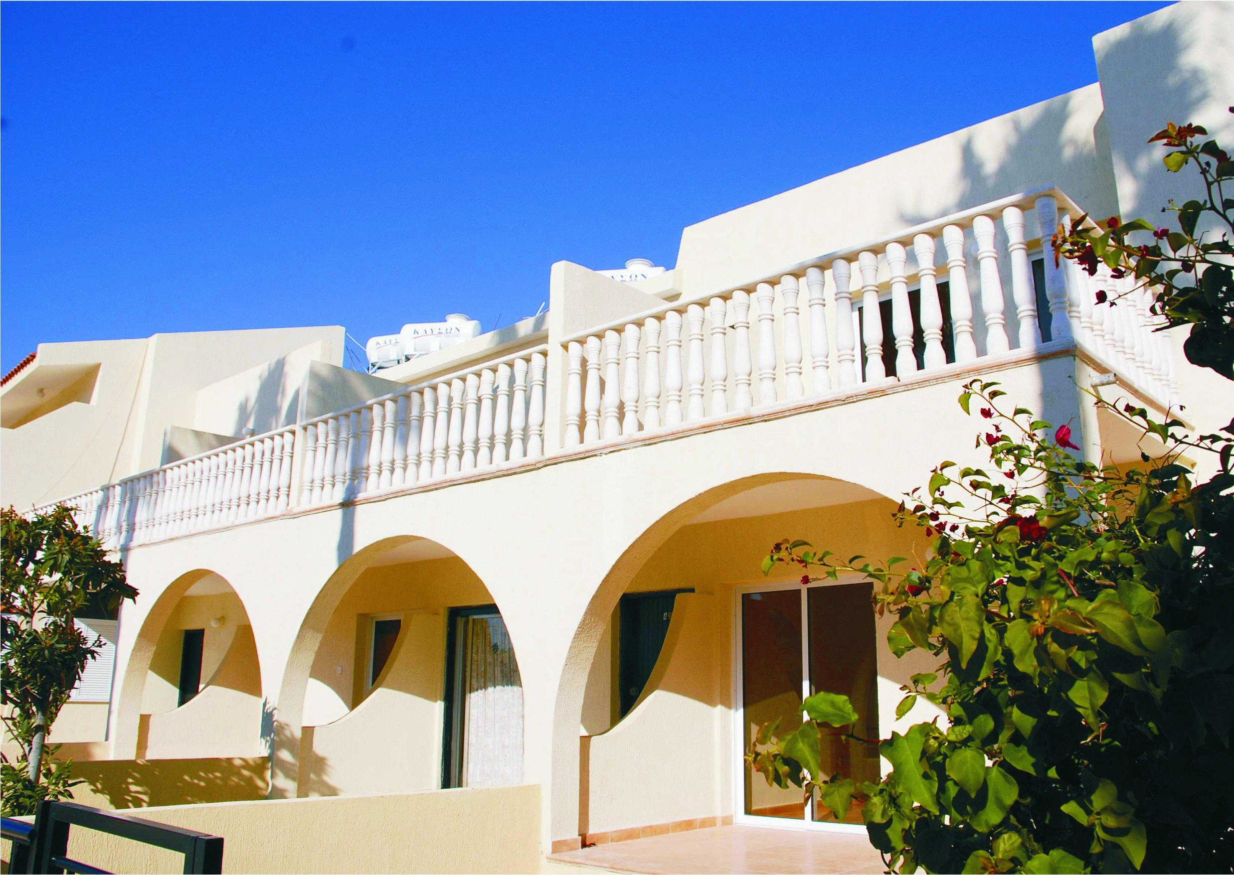 Townhouses with a swimming pool and garden in Paphos, Cyprus