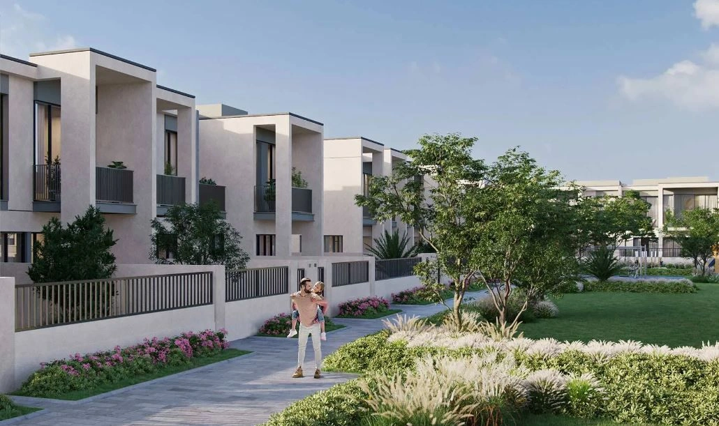 New complex of townhouses in the green area of Town Square