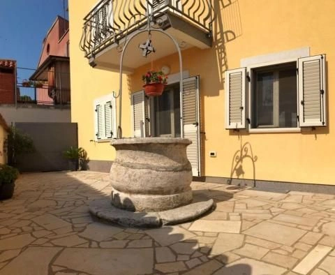 Villa with 5 residential units, communal pool and views of the Brioni Islands